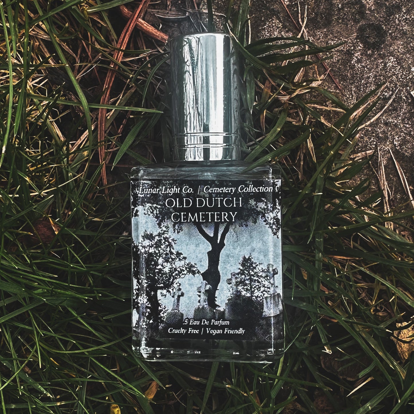old dutch cemetery perfume bottle on grass
