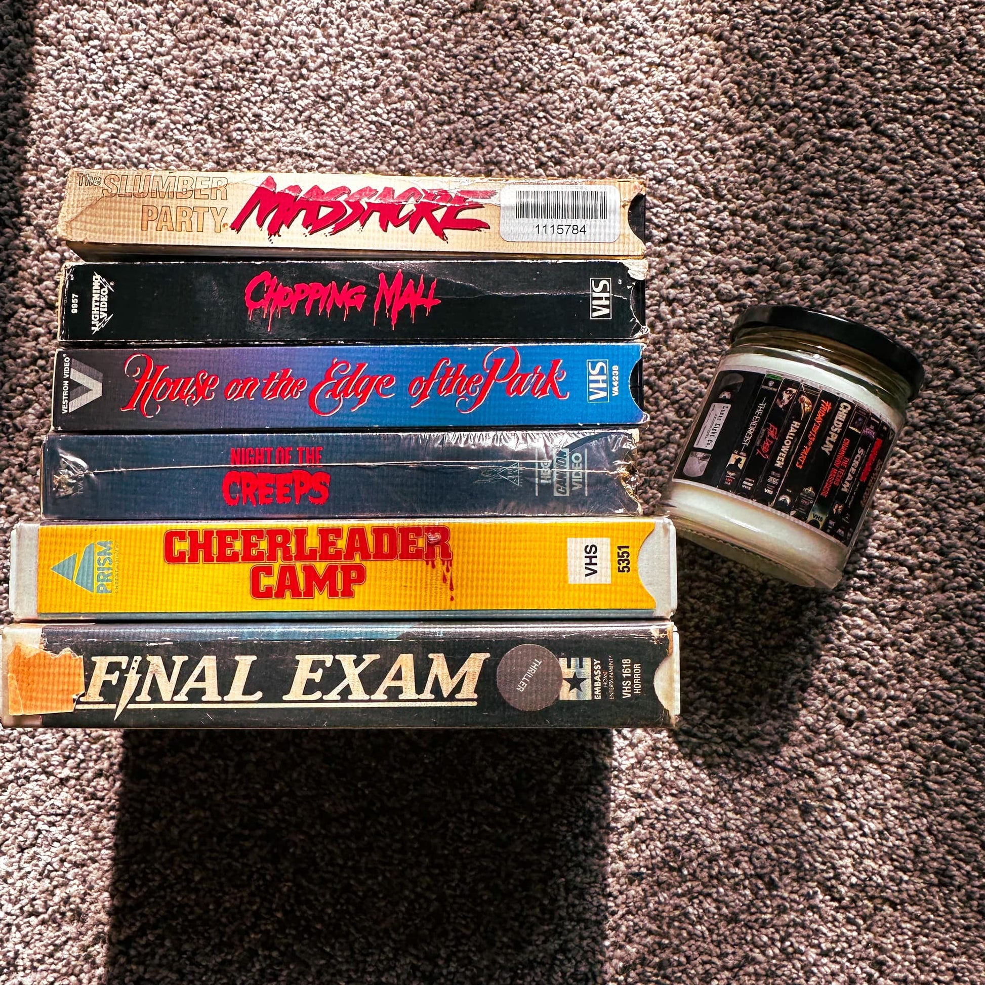 classic horror vhs candle with video tapes