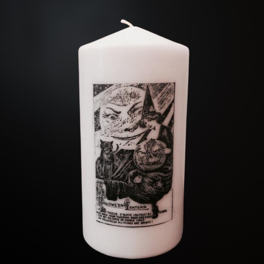 decorative halloween pillar candle with vintage witch, cat and moon illustration